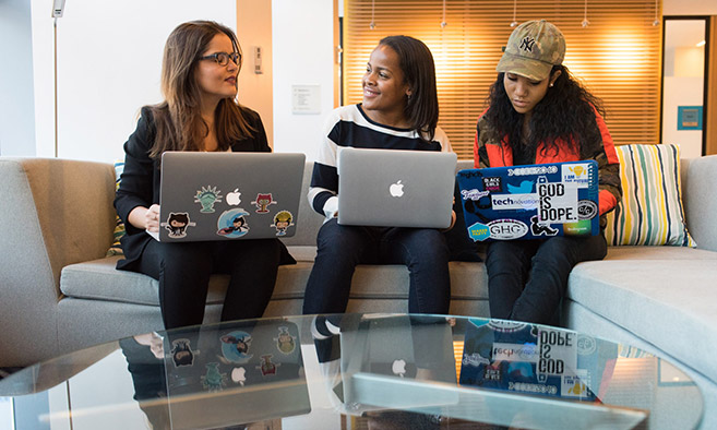 Three girls coding